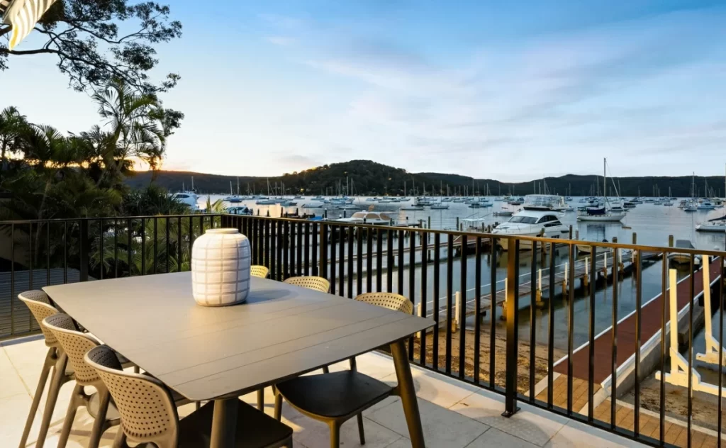 Waterfront dining area with marina views and serene surroundings.